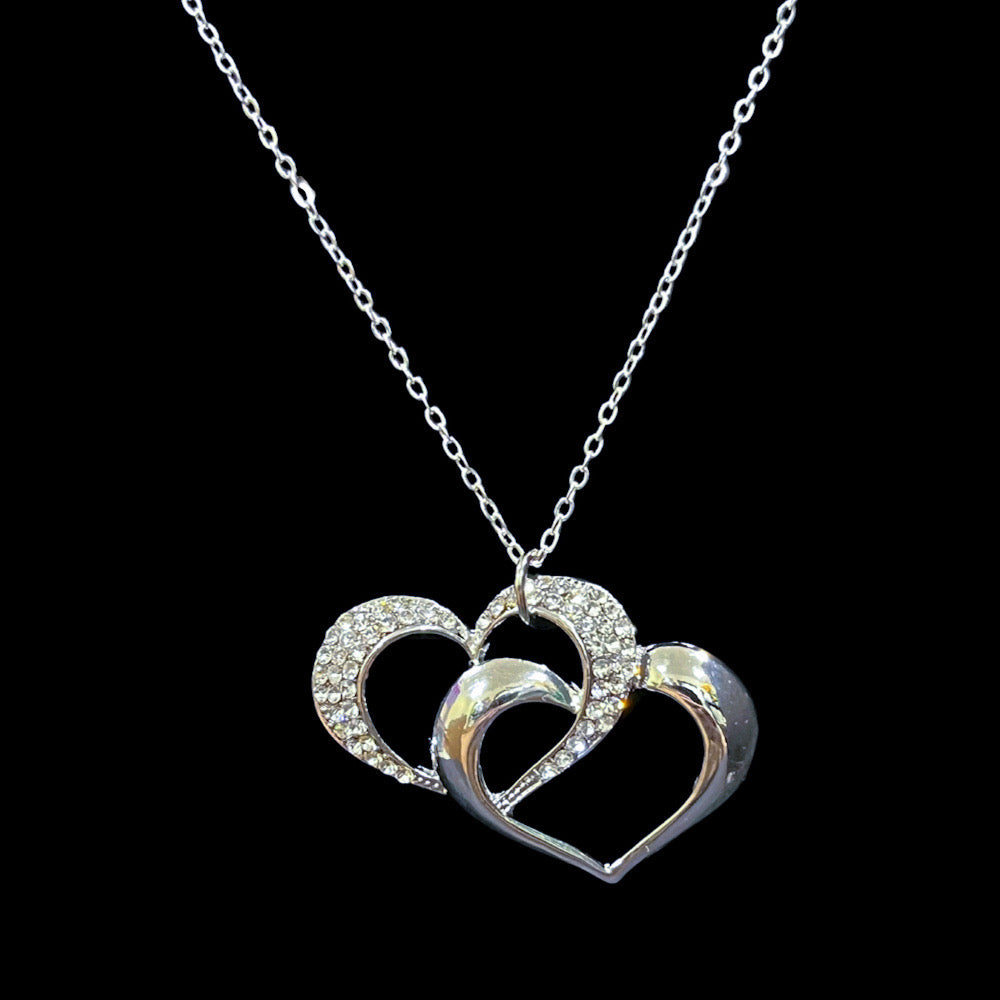 Locking Hearts Necklace Featuring Premium Crystals